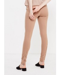 Светло-коричневые узкие брюки от Modis