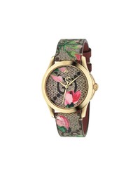 Женские светло-коричневые часы с цветочным принтом от Gucci
