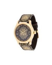 Женские светло-коричневые часы от Gucci