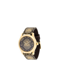 Женские светло-коричневые часы от Gucci