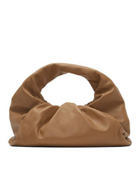 Светло-коричневый кожаный клатч от Bottega Veneta