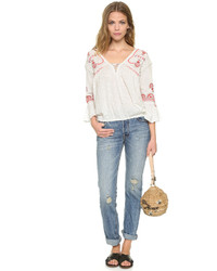 Светло-коричневый соломенный клатч от Kate Spade