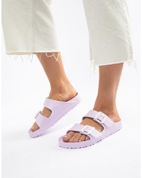 Светло-фиолетовые кожаные сандалии на плоской подошве