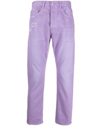 Светло-фиолетовые рваные джинсы
