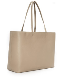 Серая кожаная большая сумка от Tory Burch