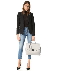 Серая кожаная большая сумка от Tumi