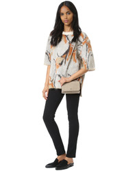 Женская серая сумка от Tory Burch