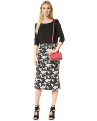 Женская серая сумка от Tory Burch