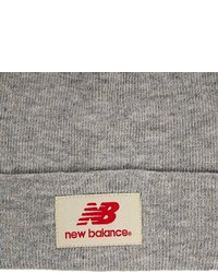 Женская серая шапка от New Balance