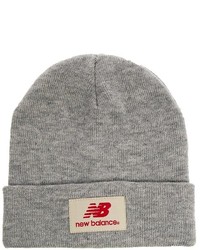 Женская серая шапка от New Balance