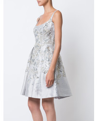 Серебряное платье с пышной юбкой с украшением от Marchesa