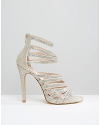 Серебряные босоножки на каблуке от Faith