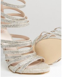 Серебряные босоножки на каблуке от Faith