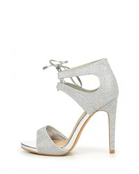 Серебряные босоножки на каблуке от Stephan
