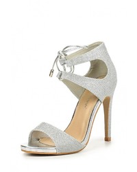 Серебряные босоножки на каблуке от Stephan