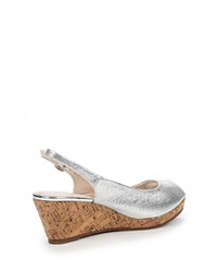 Серебряные босоножки на танкетке от Janessa