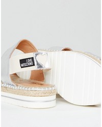 Женские серебряные босоножки от Love Moschino