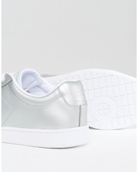 Женские серебряные кеды от Lacoste