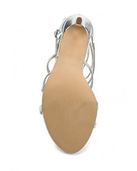 Серебряные кожаные босоножки на каблуке от Aldo