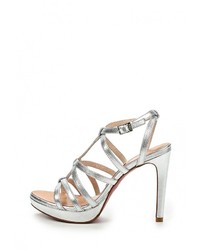 Серебряные кожаные босоножки на каблуке от Cuplé