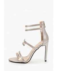 Серебряные кожаные босоножки на каблуке от Diora.rim