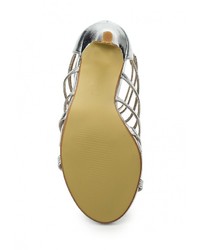 Серебряные кожаные босоножки на каблуке от Mada-Emme