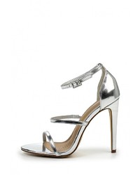 Серебряные кожаные босоножки на каблуке от Spurr
