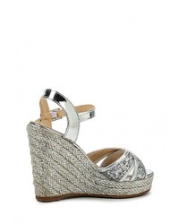 Серебряные кожаные босоножки на танкетке от Bellamica