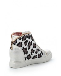 Серебряные кожаные кроссовки на танкетке от Via Giulia