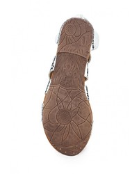 Серебряные кожаные сандалии на плоской подошве от Catisa