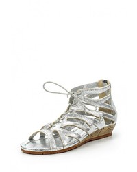 Серебряные кожаные сандалии на плоской подошве от Coco Perla