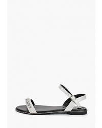 Серебряные кожаные сандалии на плоской подошве от Fassen