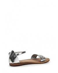 Серебряные кожаные сандалии на плоской подошве от Gioseppo