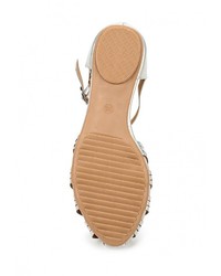 Серебряные кожаные сандалии на плоской подошве от Mixfeel