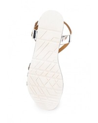 Серебряные кожаные сандалии на плоской подошве от Renda