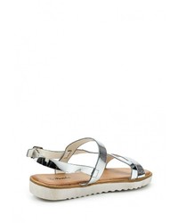 Серебряные кожаные сандалии на плоской подошве от Renda