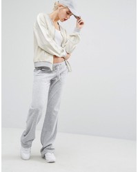 Женские серебряные спортивные штаны от Juicy Couture