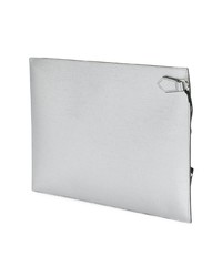 Серебряный кожаный клатч от DKNY