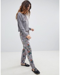 Серые брюки-галифе с цветочным принтом