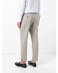 Серые брюки чинос от Gucci