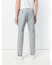 Серые брюки чинос от Prada