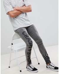 Мужские серые зауженные джинсы с принтом от ASOS DESIGN