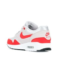 Женские серые кожаные низкие кеды от Nike