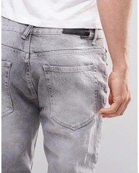 Мужские серые рваные джинсы от Religion
