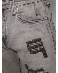 Мужские серые рваные джинсы от True Religion