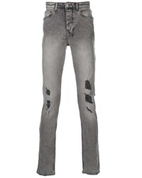 Мужские серые рваные зауженные джинсы от Ksubi