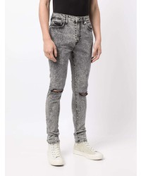 Мужские серые рваные зауженные джинсы от True Religion
