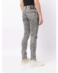 Мужские серые рваные зауженные джинсы от True Religion