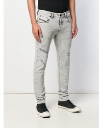 Мужские серые рваные зауженные джинсы от Diesel