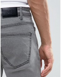 Мужские серые рваные зауженные джинсы